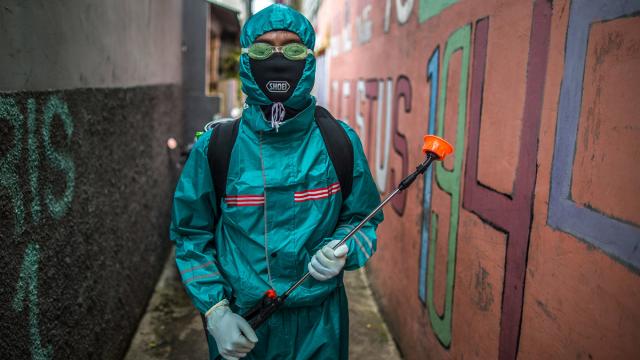 A volunteer, posed before spraying disinfectants in a public area in Jakarta, Indonesia on 27 March 2020.