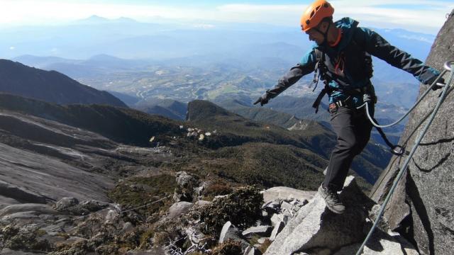 Doing the Mount Kinabalu Via-Ferrata. Photo credit: Sabah Tourism Board.