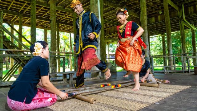 Dancers performing a traditional dance in Sarawak.