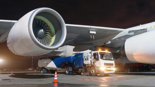 Refueling an aircraft. Photo credit: iStock/aapsky